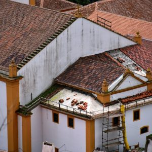 a view of a building with a lot of roof tiles
